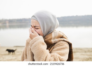 Portrait Of A Young Woman Laughing Hard To A Joke