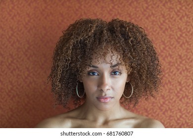 Portrait of a young woman looking sultry