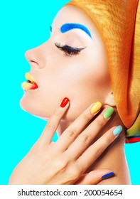 Portrait young woman with multicolored make-up