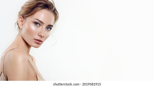 Portrait of a young woman with natural makeup and natural styling.Advertising natural cosmetics.Advertising for a beauty salon.Care cosmetics, face and body skin care. - Shutterstock ID 2019581915