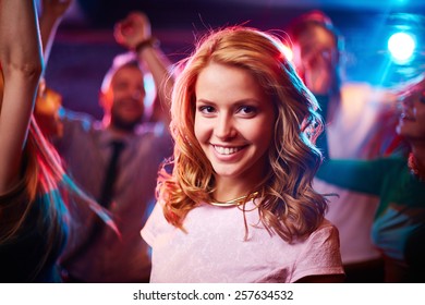 Portrait Of Young Woman In Nightclub