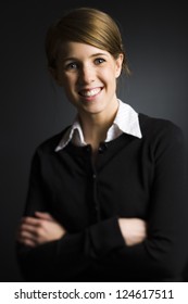 Portrait Of Young Woman On Black Background