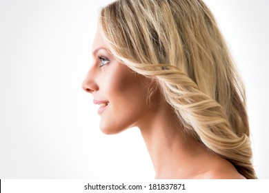 Portrait Of Young Woman In Profile With Blond Hair