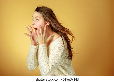 Portrait Of Young Woman With Shocked Facial Expression