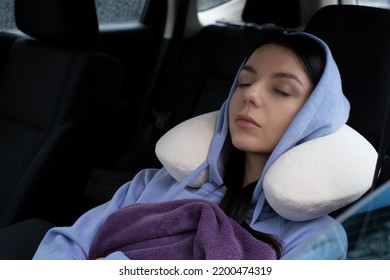 Portrait Of A Young Woman Sleeping In Her Car In Travel Road Trip.