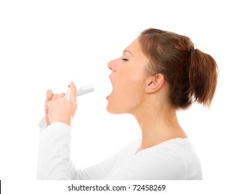 A Portrait Of A Young Woman With Sore Throat Spray Over White Background