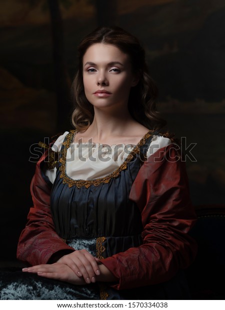 Portrait of a young\
woman in the style of a Renaissance painting. Beautiful mysterious\
girl in medieval dress