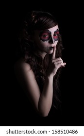 Portrait Of Young Woman With Sugar Skull Make-up.