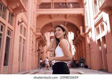 Portrait of young woman visiting the historic palace Casa de Cultura Mario Quintana in Porto Alegre, Brazil