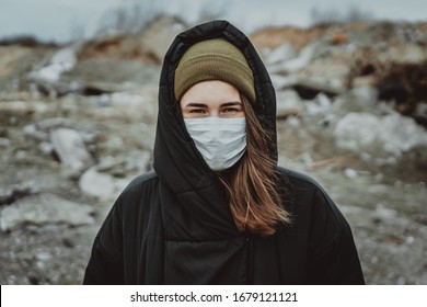 Portrait of young woman wearing medical mask, health protection from influenza virus, epidemic and infectious diseases. Protect your health. Coronavirus concept. Virus spread flu prevention carantine. - Powered by Shutterstock