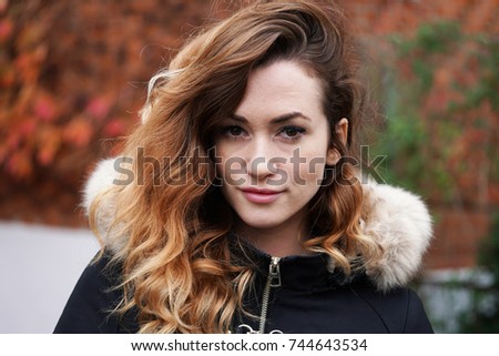 Similar – Image, Stock Photo contemplative young woman in winter jacket