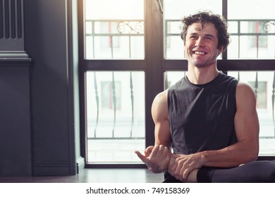 Portrait Of Young Yoga Teacher Smiling After Meditating And Doing Yoga