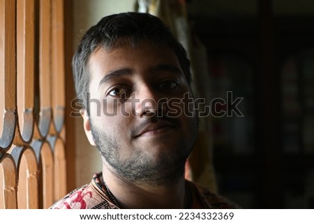 Portrait of an youngman in light and shadow