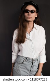 Portraits of beautiful brunette girl in sunglasses - Shutterstock ID 1118077223