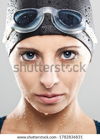 Portraits of a beautiful swimming sportswoman
