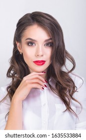 Portret Of Young Woman In White Shirt And Black Skirt With Red Lips On White Background. Buisness Woman