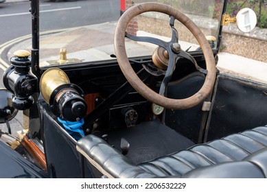 Portsmouth, England, September 25th 2022. Classic Model T Ford Car Parked On A Residential Street In England. Showing Details Of The Steering Wheel, Horn And Lamp