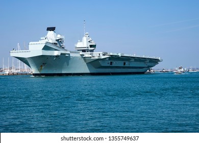 Portsmouth, Hampshire, UK April 1 2019 Royal Navy Aircraft Carrier HMS Queen Elizabeth Leaving Port En Route To Rosyth, Scotland For Routine Maintenance