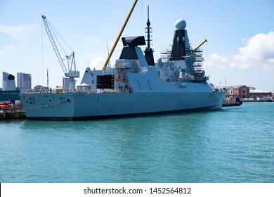 Portsmouth, Hampshire, UK July 16 2019 Royal Navy Daring Class Destroyer HMS Defender Moored In The Dockyard