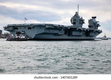 Portsmouth, Hampshire, UK May 25 2019 Royal Navy Aircraft Carrier HMS Queen Elizabeth Arriving From Rosyth Following Routine Maintenance