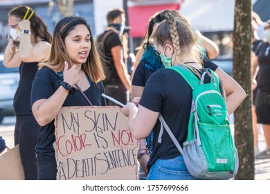 Portsmouth, New Hampshire (USA) - June 4, 2020).  Thousands Gathered At Market Square To Request Justice For George Floyd. Protester In Conversation.