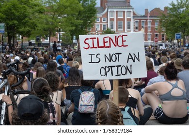 Portsmouth, New Hampshire (USA) - June 4, 2020).  thousands gathered at Market Square to request justice for George Floyd. A white sign raised in the middle of the crowd - Shutterstock ID 1758319184