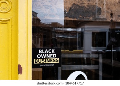 Portsmouth, NH / USA - October 23 2020: Black Owned Business Sign On The Door Of A Business In Portsmouth, NH