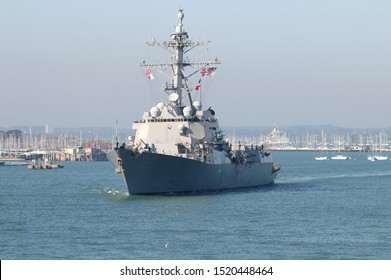 PORTSMOUTH, UK – 10TH OCT 2018: USS Farragut, An Arleigh Burke Class Guided Missile Destroyer, Leaves Harbour To Join The Aircraft Carrier USS Harry S Truman On NATO Exercises