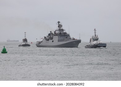 PORTSMOUTH, UK – 13TH AUG 2021: Tugs Escort The Indian Navy Ship INS TABAR Into The Naval Base. The Russian Built Talwar Class Frigate Is On A European Deployment