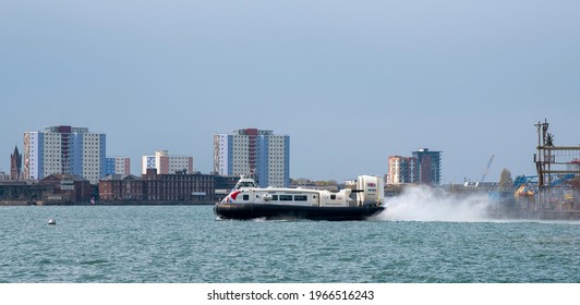 Portsmouth, UK. 2021.  Passenger carrying hovercraft from Portsmouth Southsea to Ryde on the Isle of Wight outbound service to Ryde. Leaving with a backdrop across the Solent of the Gosport skyline.
