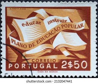 Portugal - circa 1954: a postage stamp from Portugal, showing an Open Book with a ribbon. National literacy campaign . brown
