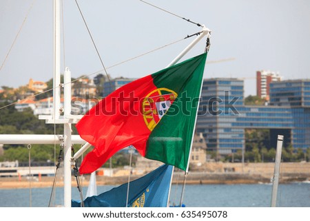 Similar – Image, Stock Photo Portuguese flag on boat in front of old town of Porto / Portugal