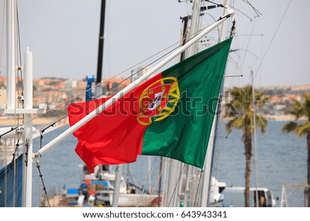 Similar – Image, Stock Photo Portuguese flag on boat in front of old town of Porto / Portugal