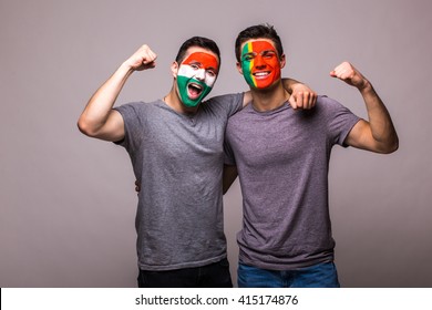 Portugal Vs Hungary On White Background. Football Fans Of National Teams Celebrate, Dance And Scream. European Football Fans Concept.