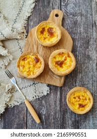 Portugese Egg Tart With A Wooden Background