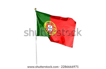 Portuguese flag in the cloudy sky. waving in the sky
