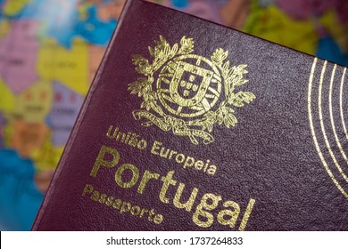 Portuguese international European Union foreign passport. On the background of the earth. Customs concept.