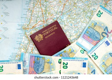 The Portuguese passport and euro banknotes on a geographical map .