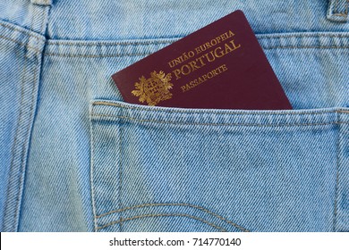 Portuguese passport on the jeans pocket