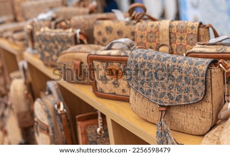 Portuguese souvenirs, brown cork bags, at the street market at the Nazare, Portugal. Foto stock © 