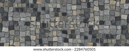 Portuguese Stone Pavement or Calcada Portuguesa Granite Cobblestone Road Top View. Mosaic Brick Cobblestoned Floor with Tiles and Small Stones
