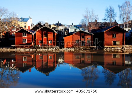 Porvoo, Finland. Classic old wood houses and their reflection in river