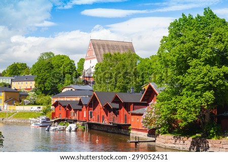 Porvoo landscape. Small historical town in Finland. Old red wooden houses and trees on the coast