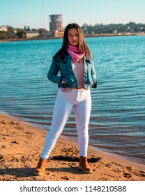 Posadas,Misiones/Argentina 1/08/2018
Teenage Woman Taking Fashion Photos Outdoors On A Sunset, Her Dress Style Is Urban And A Bit Formal