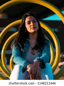 Posadas,Misiones/Argentina 1/08/2018
Teenage Woman Taking Fashion Photos Outdoors On A Sunset, Her Dress Style Is Urban And A Bit Formal