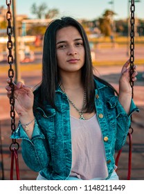 Posadas,Misiones/Argentina 1/08/2018
Teenage Woman Taking Fashion Photos Outdoors On A Sunset, Her Dress Style Is Urban And A Bit Formal