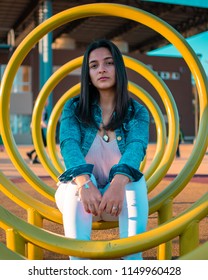 Posadas,Misiones/Argentina 1/08/2018
Teenage Woman Taking Fashion Photos Outdoors On A Sunset, Her Dress Style Is Urban And A Bit Formal