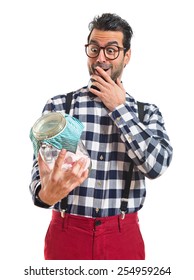 Posh Boy  Holding Glass Jar With Sweets Inside 