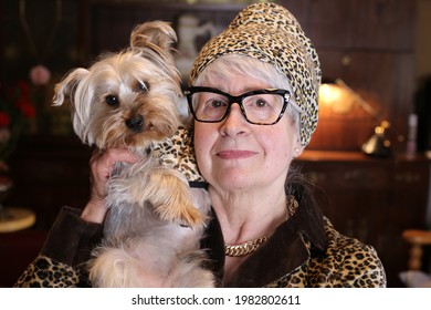 Posh Senior Woman With Vintage Leopard Print Look Matching Her Dog