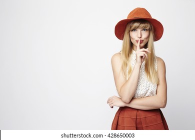 Posing Blond Woman With A Secret, Portrait